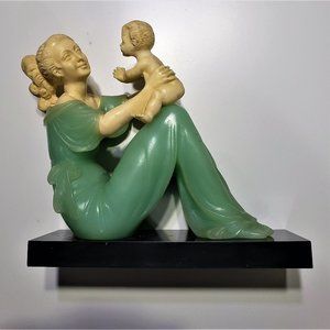 Beautiful Statuette of Mother and Child. Perfect for any decor.